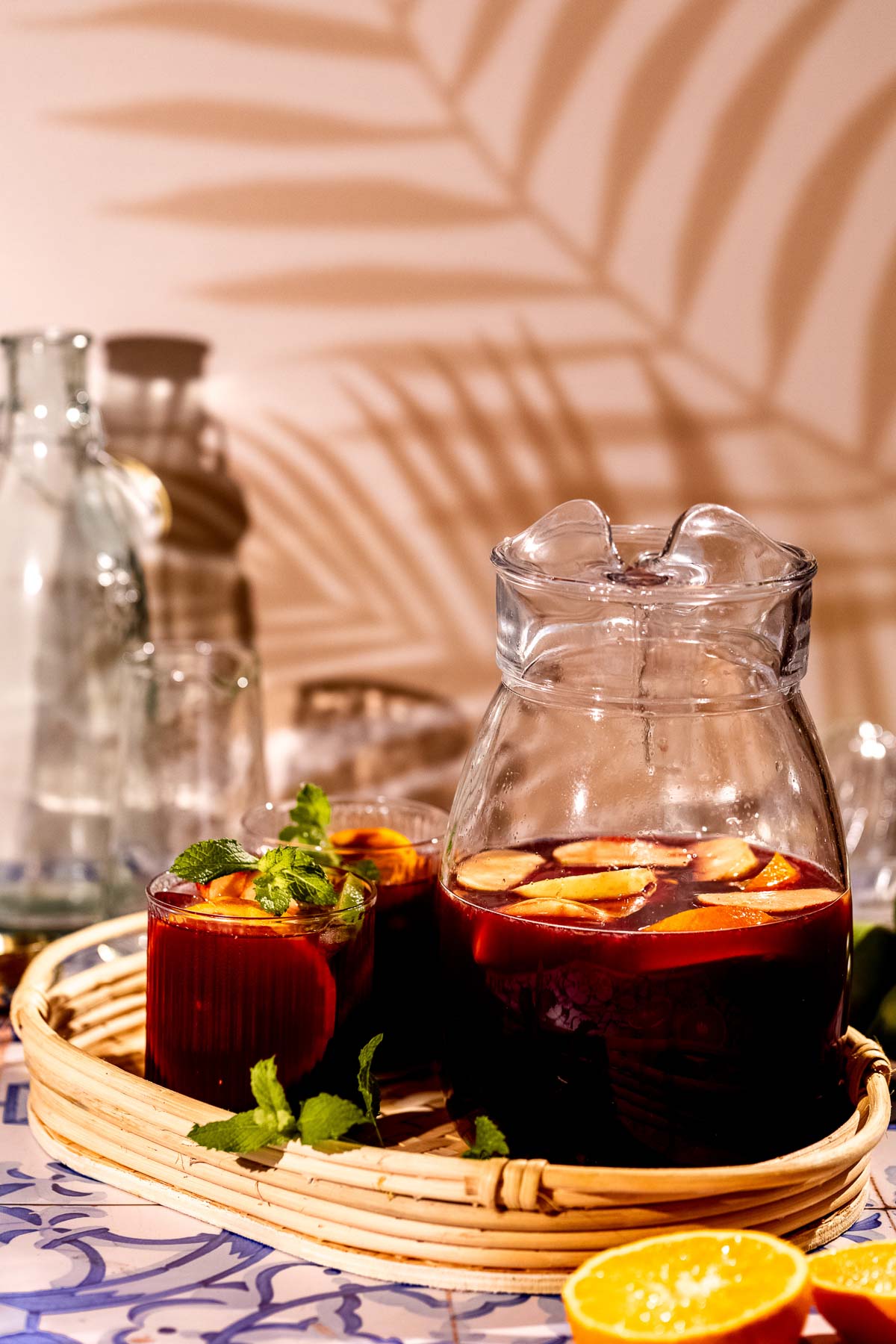 Pitcher of classic red wine sangria with fruit floating in it.