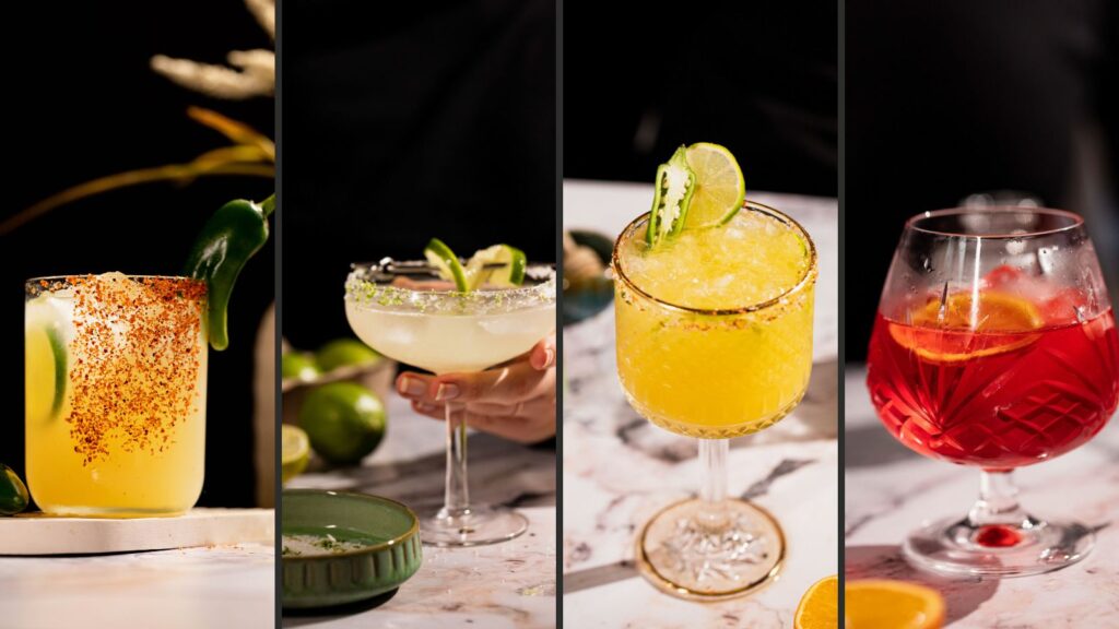 Four colorful Cinco de Mayo cocktails—one with a chili rim, a margarita with lime, a yellow lime-garnished drink, and a red cocktail with orange slices—are displayed side by side.