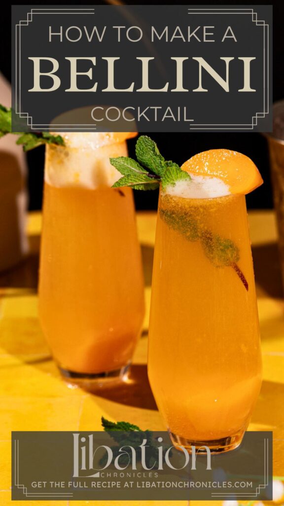 Two Bellini cocktails with mint and peach garnishes sit in tall glasses on a wooden surface.