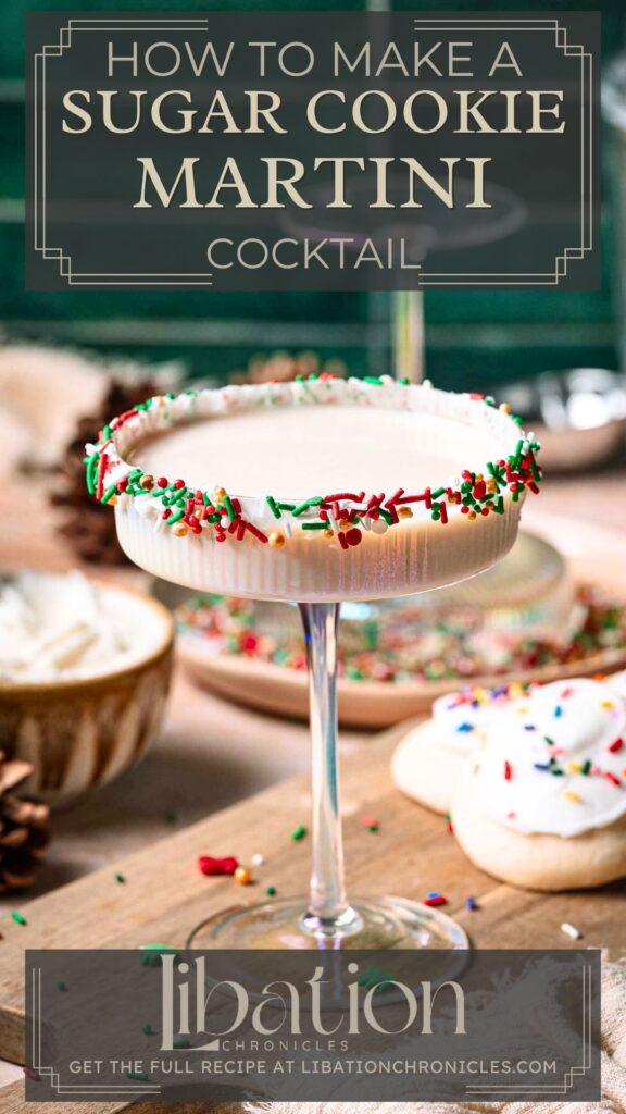 A sugar cookie martini in a sprinkle-rimmed coupe glass, with cookies, holiday decor, and ingredients nearby.